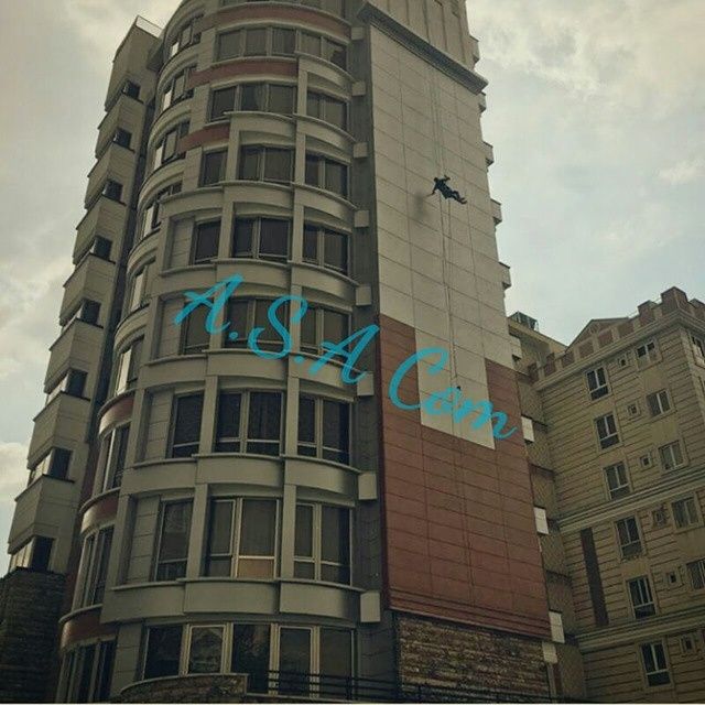 شستشوی نما با طناب